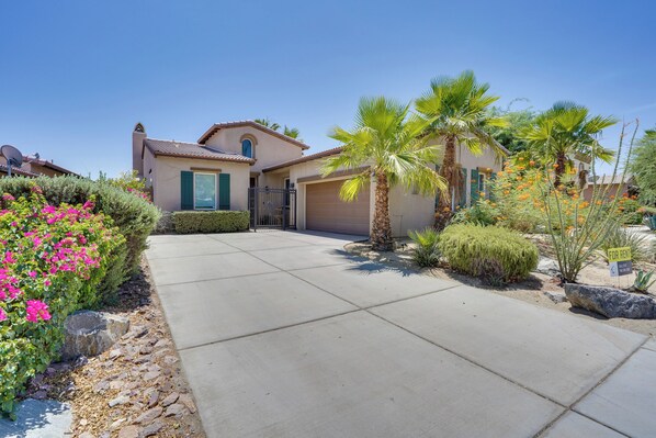 A residential property with a driveway, palm trees, and a 'For Rent' sign. - Mtn Views & Resort Perks: Palm Desert Escape! (Palm Desert)