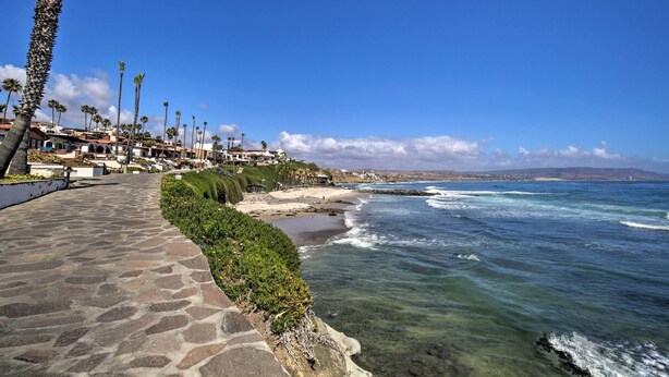 A coastal walkway with stone steps, palm trees, and a beach. - Rosarito Beach Home in Las Gaviotas w/ Ocean Views (Playas de Rosarito)