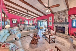 TV, fireplace, books
