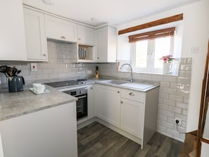 Fridge, electric kettle, toaster, cookware/dishes/utensils
