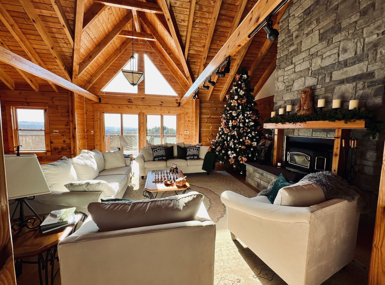 Mountaintop lodge, breathtaking views, private hiking trails & arcade game room.