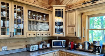Mountaintop lodge, breathtaking views, private hiking trails & arcade game room.