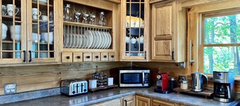 Mountaintop lodge, breathtaking views, private hiking trails & arcade game room.