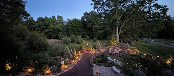 Mountaintop lodge, breathtaking views, private hiking trails & arcade game room.