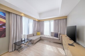 Two-Bedroom Family Suite with 1 King Bed and 1 Bunk Bed | Living room | 49-inch Smart TV with digital channels, TV - Seda Manila Bay near Ayala Malls (Parañaque)