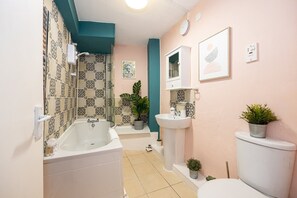 Bathtub, hair dryer, towels