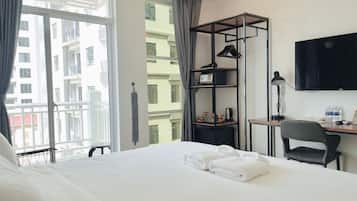 Deluxe Room, 1 King Bed, Balcony, City View | Television