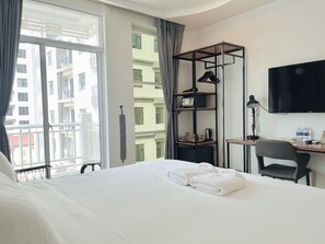 Deluxe Room, 1 King Bed, Balcony, City View | Television - Times Hotel at Bassac Lane  (Phnom Penh)
