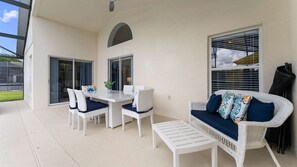 Outdoor dining - Stunning 4bed/3.5 bath pool home, great location, gated community, lake views. (Kissimmee)