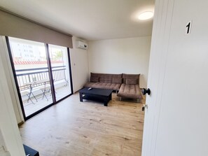 Standard Apartment | Living area | TV - Home Sweet Home Apartment (Larnaca)