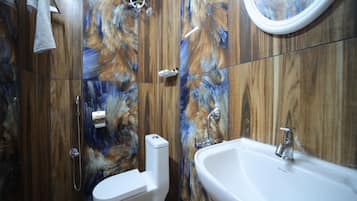 Shower, rainfall showerhead, towels