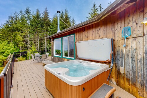 Idyllic home with water views, wrap-around deck, hot tub, and firepit - dogs ok