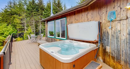 Idyllic home with water views, wrap-around deck, hot tub, and firepit - dogs ok