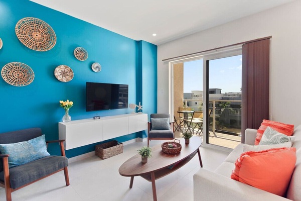 In this condo's open-concept living area, you can take in the view of Aruba's beautiful blue skies.