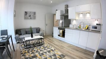 Comfort Apartment | Living area | Smart TV