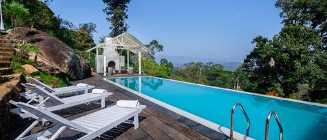 Outdoor pool, sun loungers