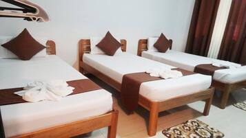 Desk, free WiFi, bed sheets