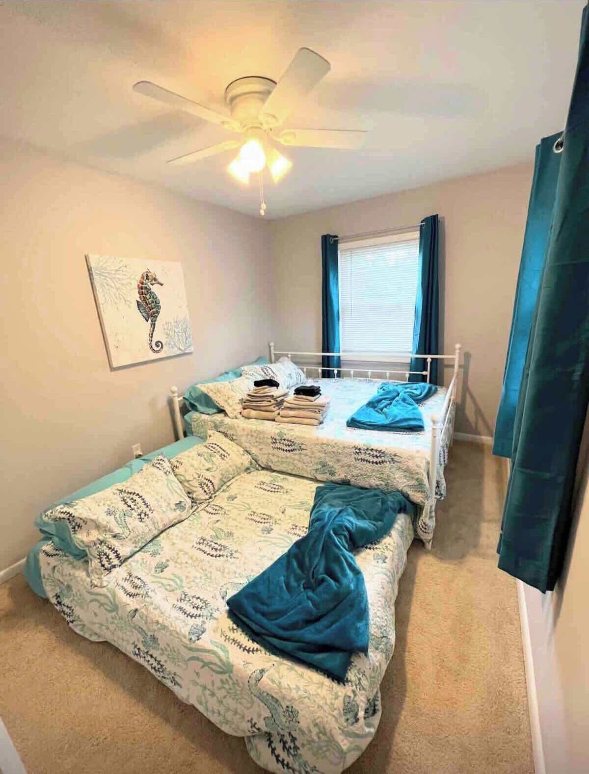 The third bedroom has a queen size bed and full size trundle bed. 