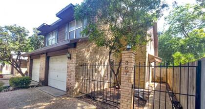 Two-story, two-bedroom, blocks from Downtown New Braunfels, Comal River, and Texas Tubes