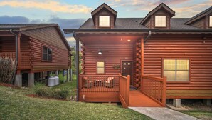A log cabin with a porch, a covered entryway, and a small deck. - Fantastic Cabin Close to Branson Entertainment- Golf & Ticket Discounts! (Branson)