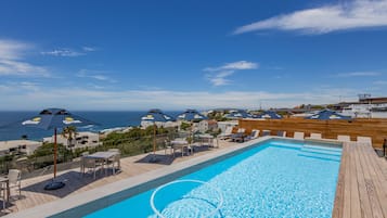 Outdoor pool, pool umbrellas, pool loungers