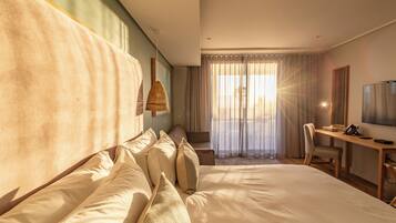 Luxury Suite, Sea View | Premium bedding, minibar, in-room safe, desk
