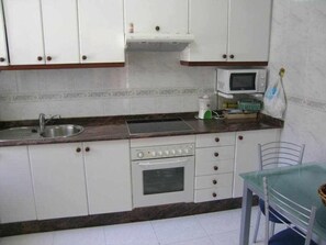 Fridge, microwave, oven, cookware/dishes/utensils