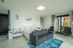Habitació Grand, 1 dormitori | Minibar amb articles gratuïts i cortines opaques
