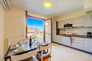 Family House, 2 Bedrooms, 2 Bathrooms, Mountainside (Cottage del Lago: Lake Maggiore Villa) | Private kitchen - Cottage del Lago: Lake Maggiore Villa With Shared Pool (Laveno Mombello)