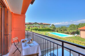 Family House, Multiple Bedrooms, 2 Bathrooms, Mountainside (Cottage del Lago) | Outdoor dining - Cottage del Lago (Laveno Mombello)