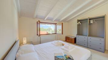 Family House, Multiple Bedrooms, 2 Bathrooms, Mountainside (Cottage del Lago) | 2 bedrooms, WiFi, bed sheets