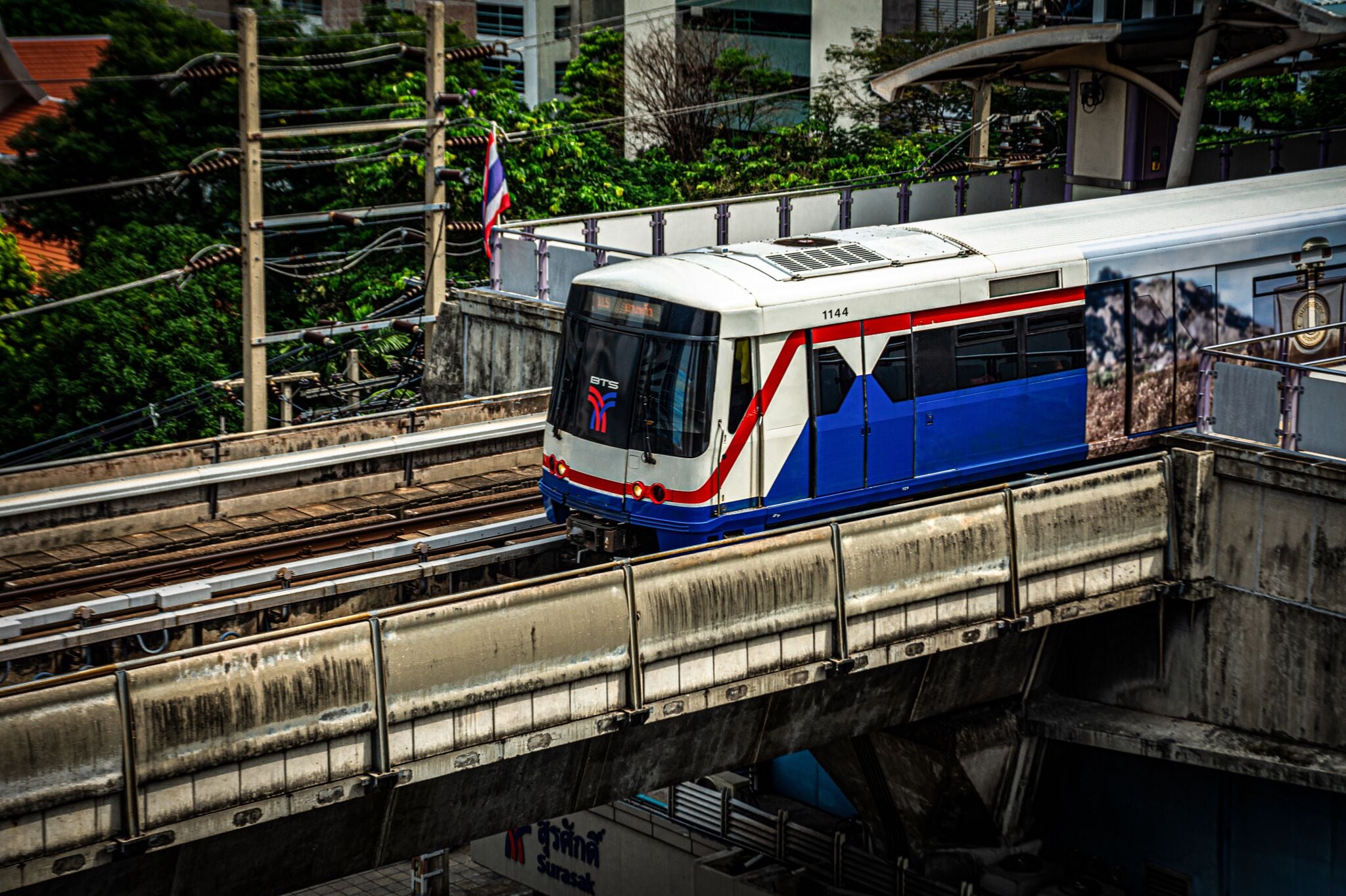A train on an elevated track.