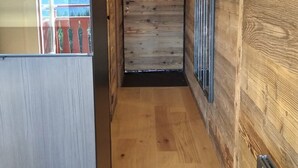 A narrow wooden hallway with a wooden floor and a metal railing on one side. - Cozy Studio for 4, Near Cernix Center and Slopes (Crest-Voland)