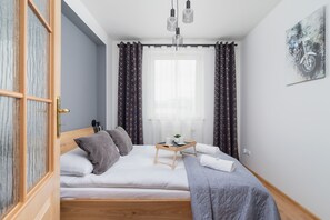 1 bedroom, desk, iron/ironing board, travel cot