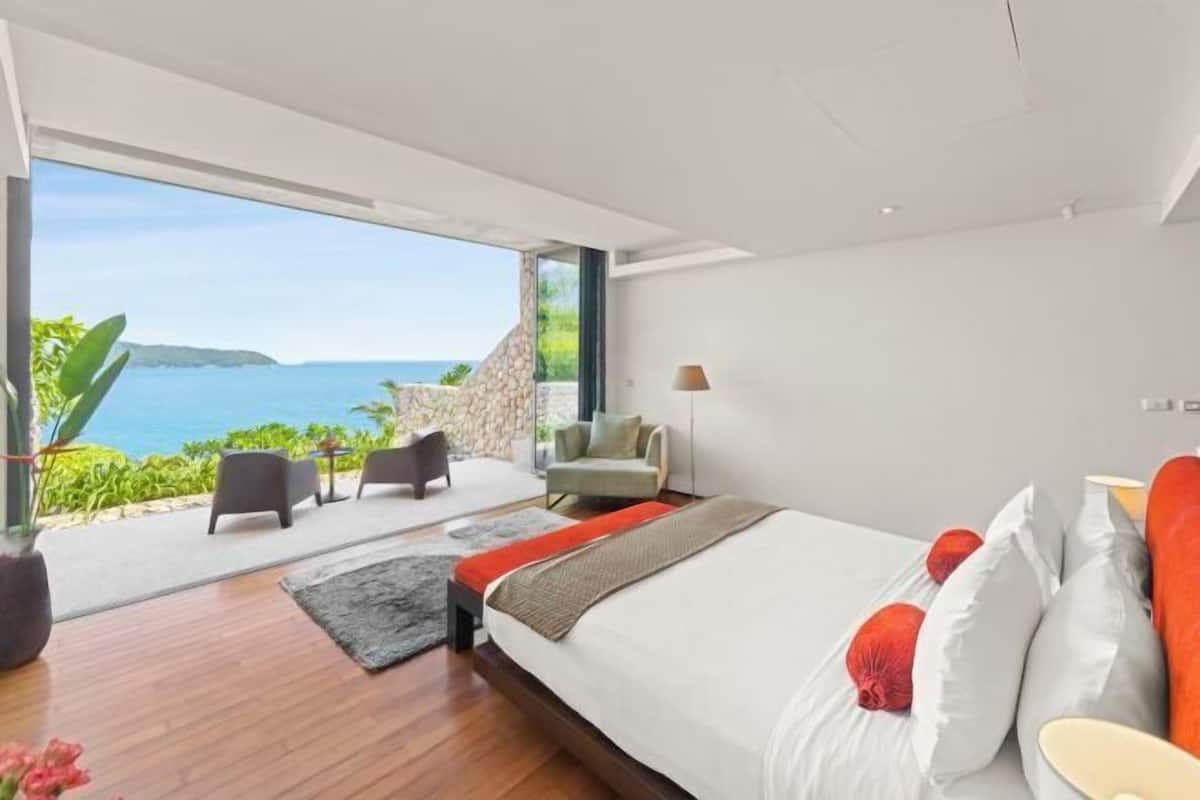 Desk, iron/ironing board, bed sheets