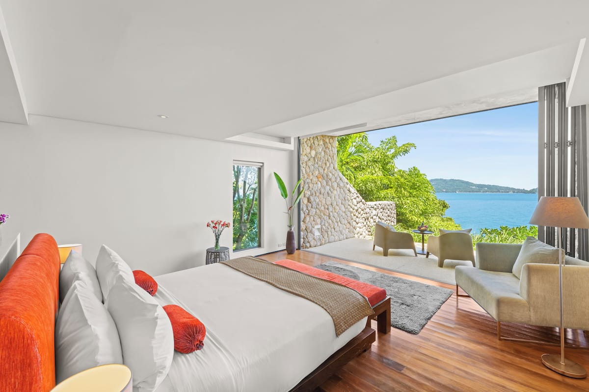 Desk, iron/ironing board, bed sheets