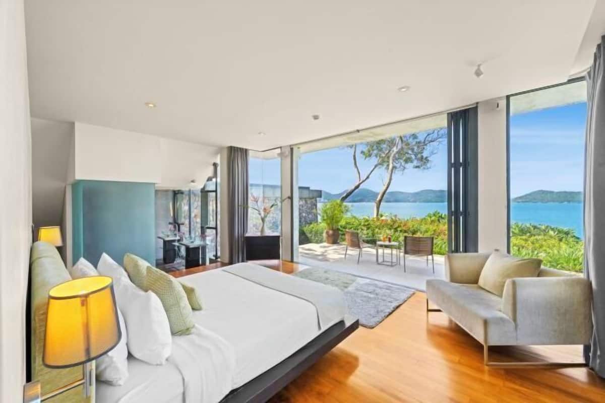 Desk, iron/ironing board, bed sheets