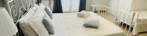 Panoramic Quadruple Room | Hypo-allergenic bedding, down duvets, individually decorated