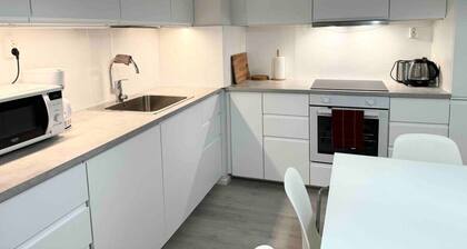 #PIHLAJISTO · Spacious 4-bedroom condo with patio, free parking