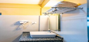 Shower, rainfall showerhead, towels, soap