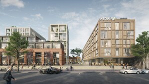 A modern building with a flat roof, large windows, and a sign reading "BOB W." - Bob W Amsterdam Noord (Amsterdam)