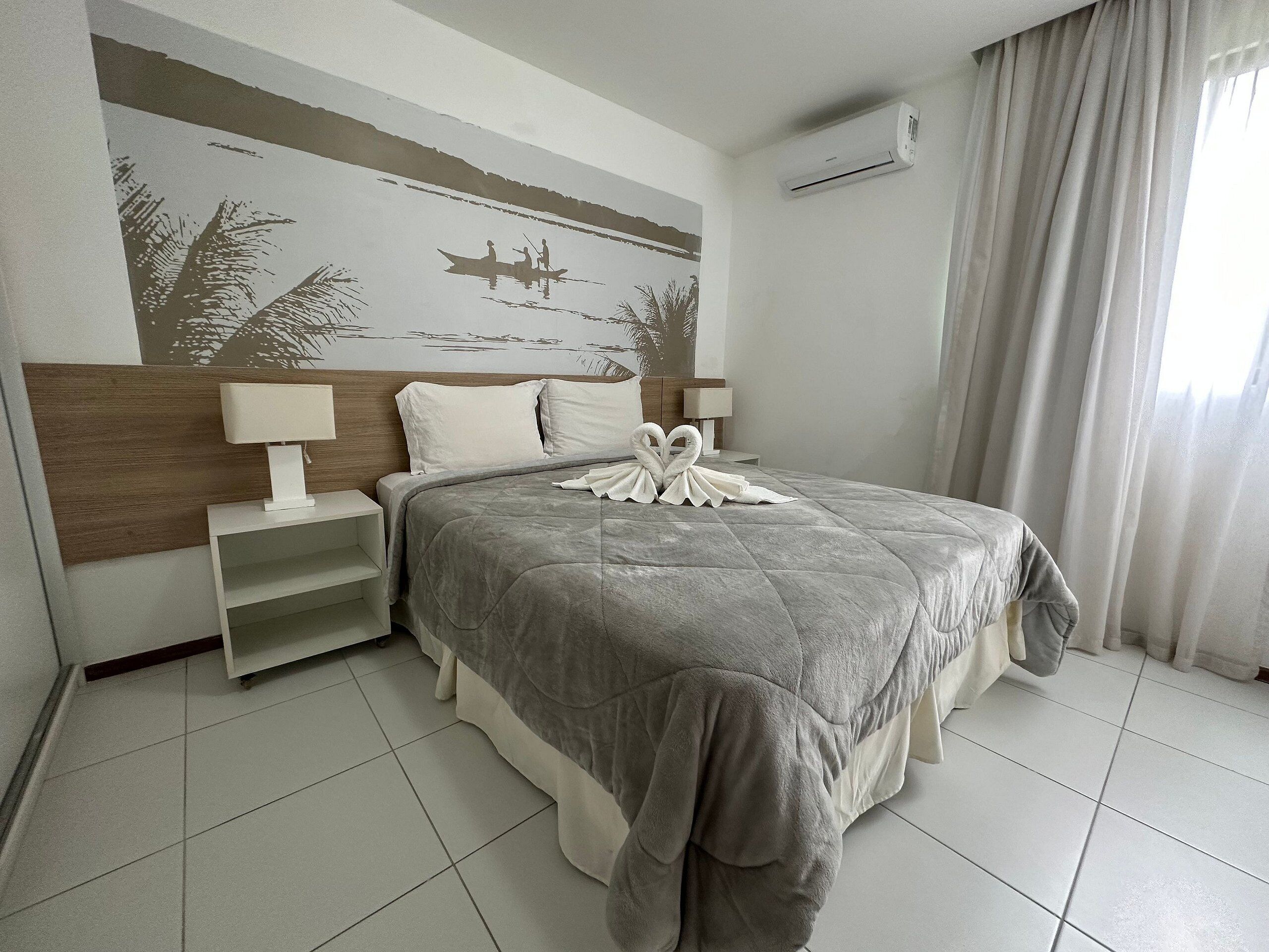 Apartamento família | Cofres nos quartos, individualmente mobiliados, cortinas blackout