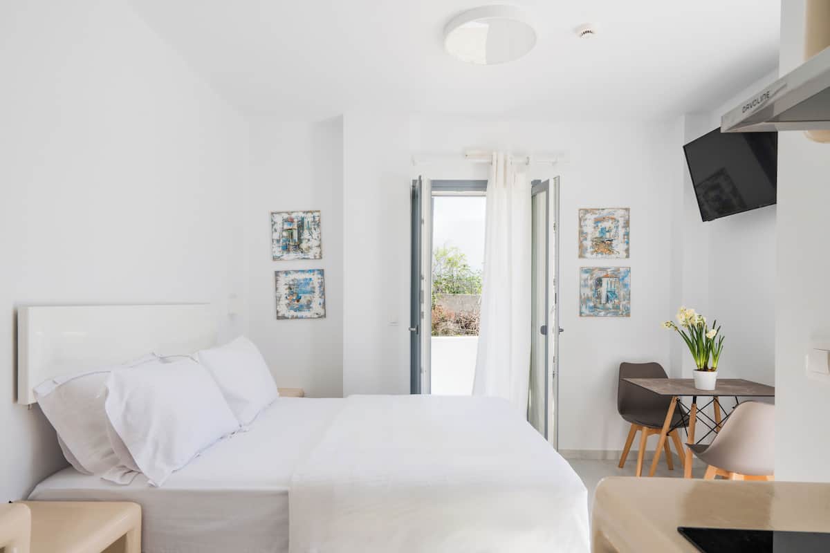 Ropa de cama de alta calidad y tabla de planchar con plancha
