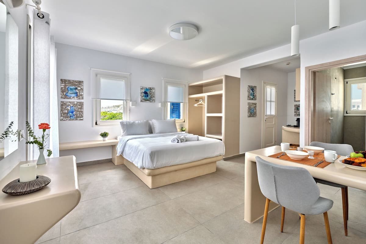 Ropa de cama de alta calidad y tabla de planchar con plancha