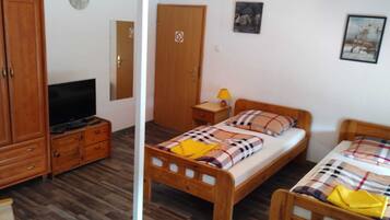 Quarto triplo conforto | Wi-Fi de cortesia, roupa de cama