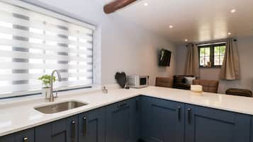 Fridge, dishwasher, electric kettle, cookware/dishes/utensils