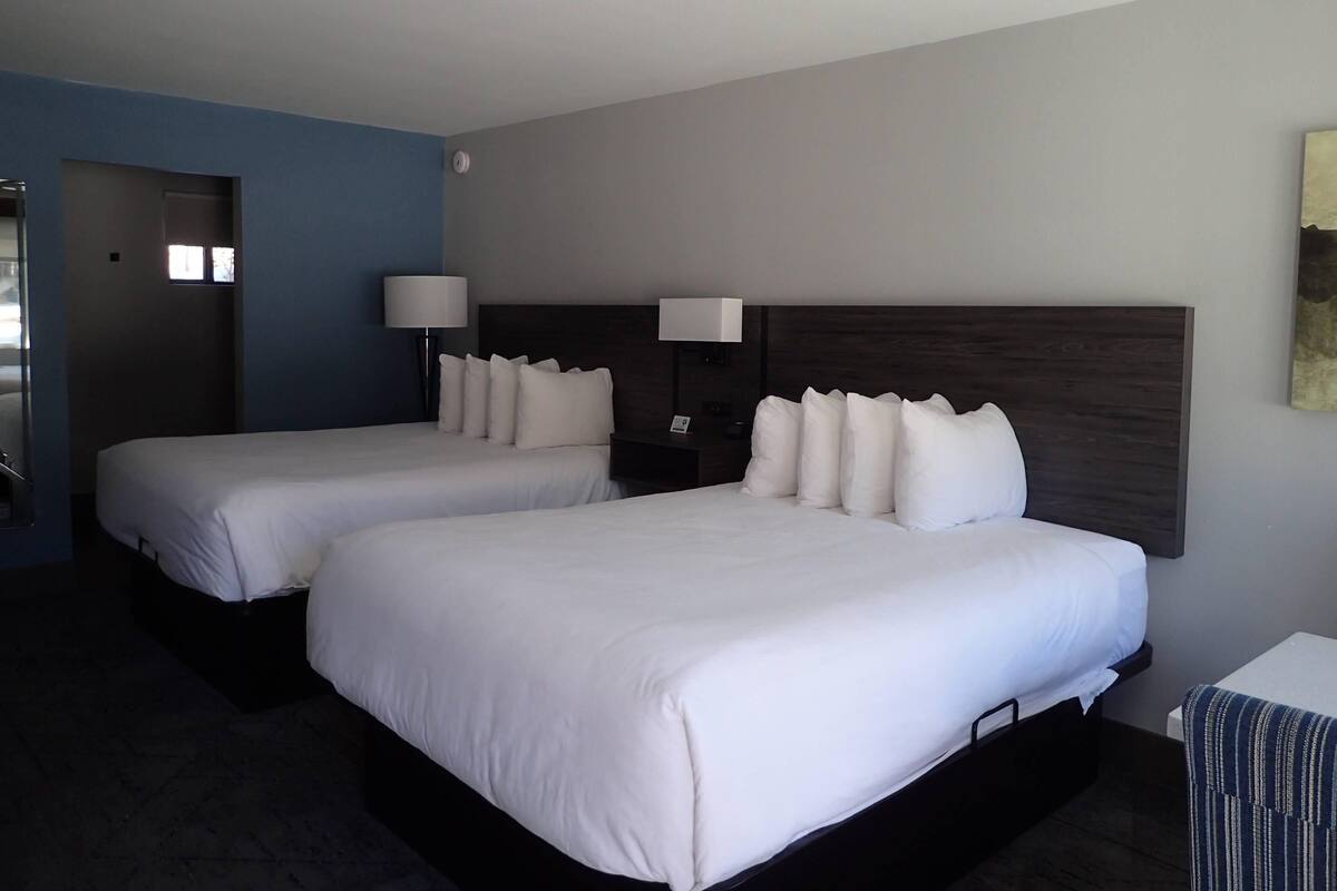 Standard Room, 2 Queen Beds, Non Smoking | 1 bedroom, down comforters, WiFi (free), bed sheets