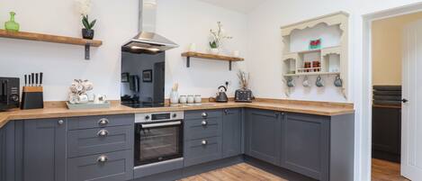 Fridge, electric kettle, toaster, cookware/dishes/utensils