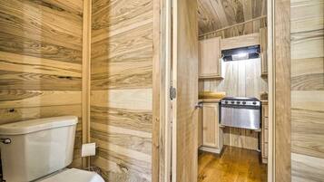 Shower, eco-friendly toiletries, towels, toilet paper