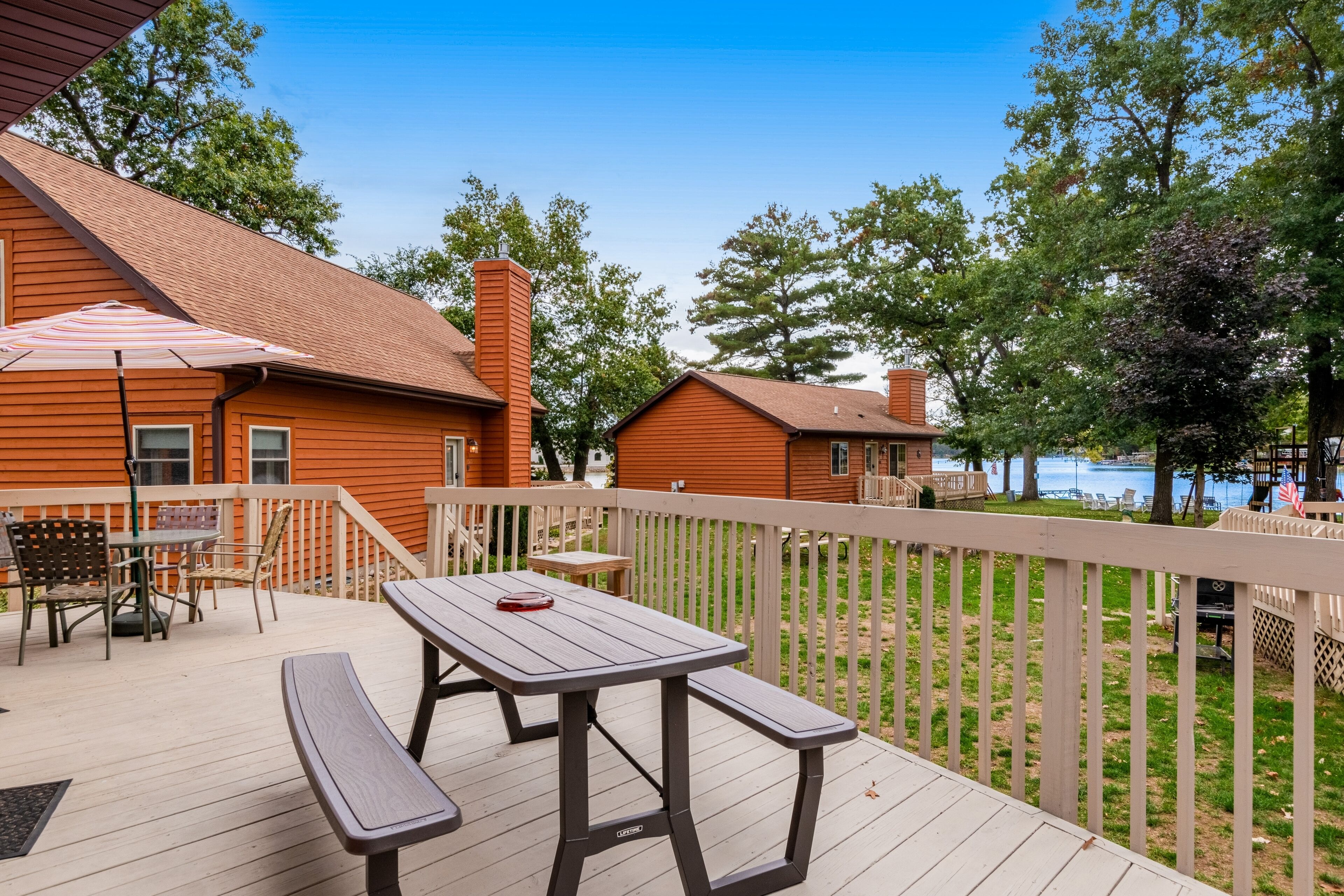 Inviting lakefront stand-alone condo with private beach, boating, & playground